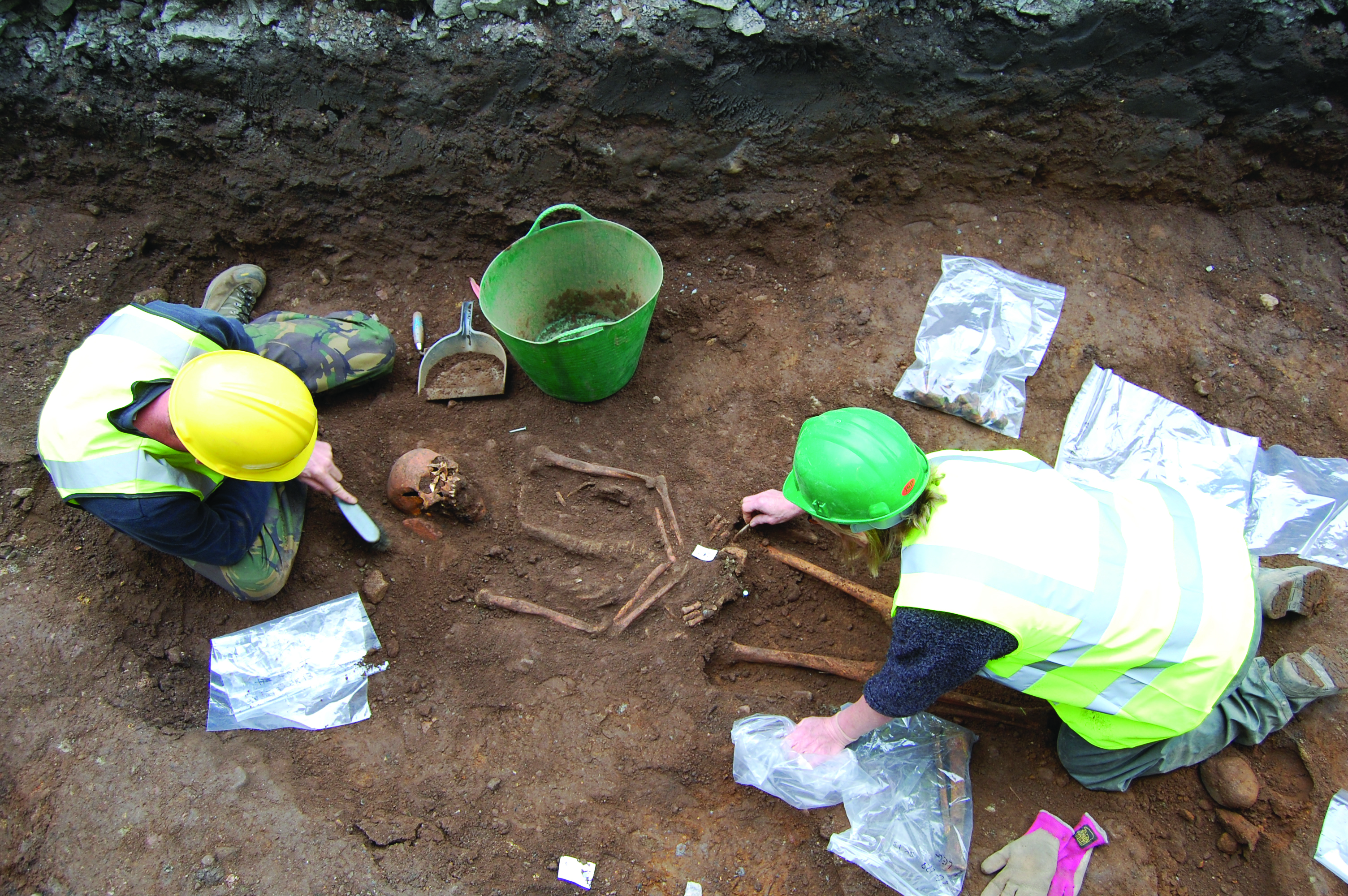 Recording and lifting one of the burials