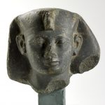 A statue head in fine green Arkose of a king