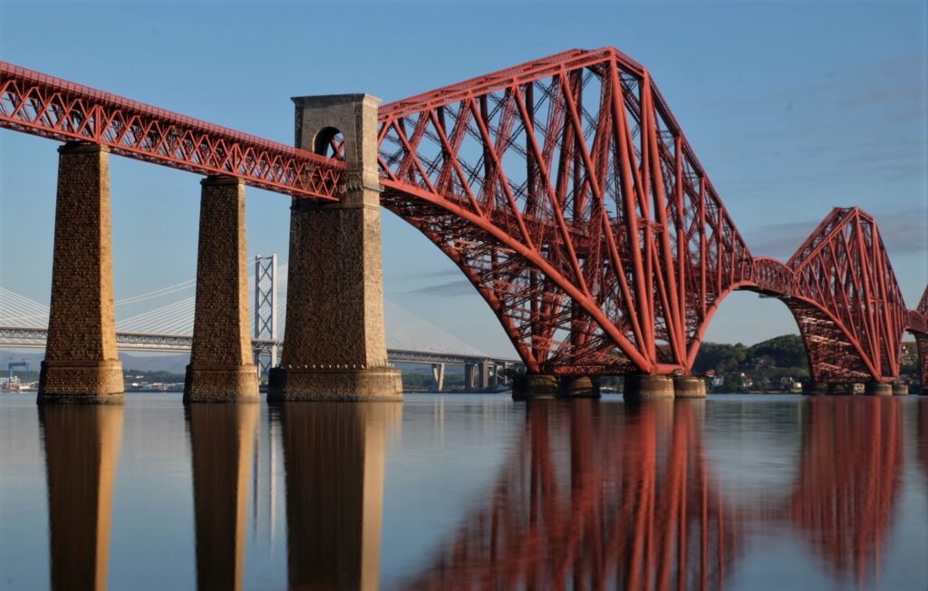 Red bridge over water